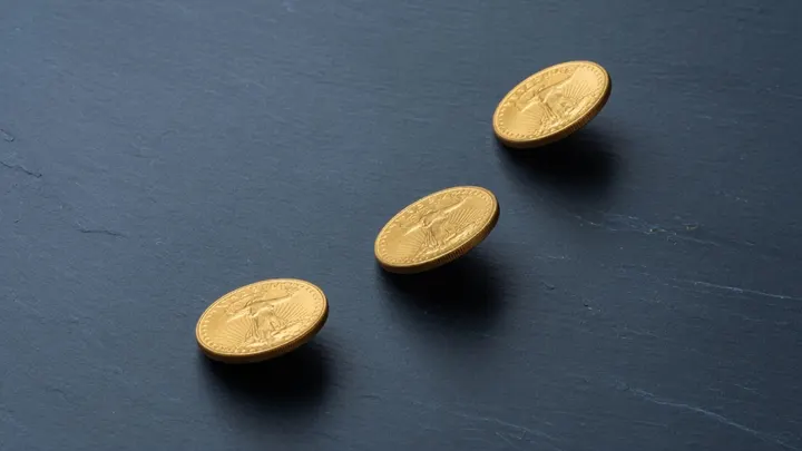 Gold coins illustrating step-by-step IRA transfer process